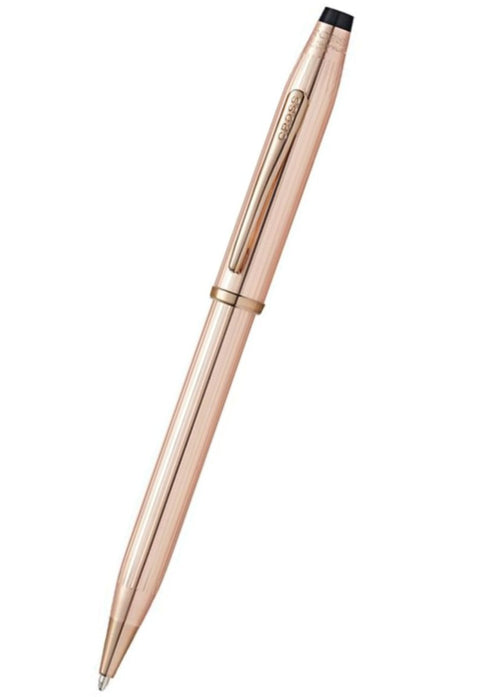 Rose gold pen on a white background