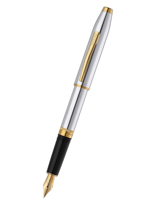 Silver and gold pen with black accents on a white background