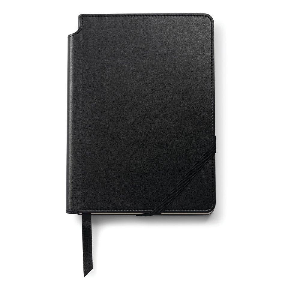 Black notebook with a strap on a white background